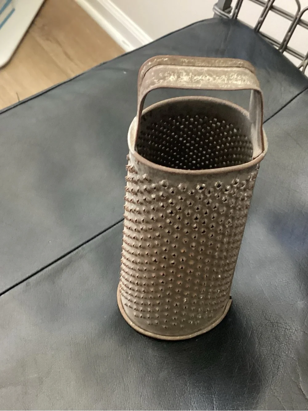 Antique Primitive small round metal tin cylinder grater. Most often used for